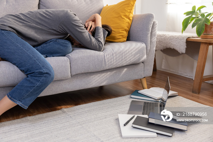 Asian Woman Rest on the Couch Suffer From Burnout Syndrome