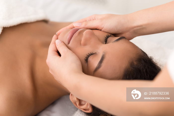 Spa face massage. Woman getting spa treatment