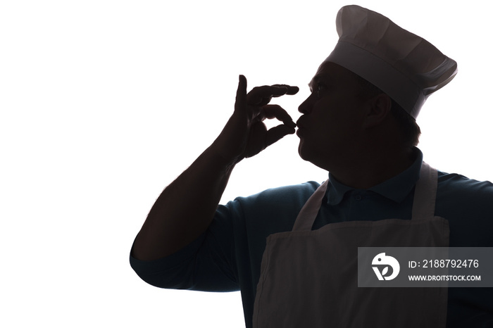 silhouette of a happy chef on a white isolated background, profile of a male face in a cook hat,food industry concept