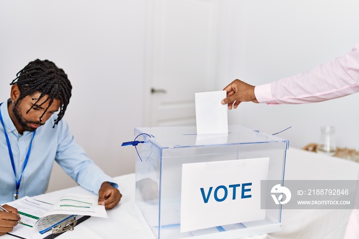 Two men voting at electoral college