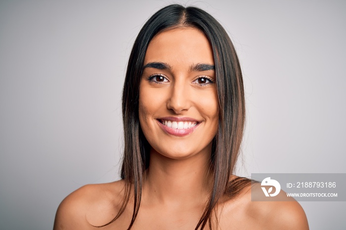 Close up of young beautiful woman with clear and pure skin. Perfect and clean skincare wearing natural makeup. Smiling happy looking fresh and healthy.