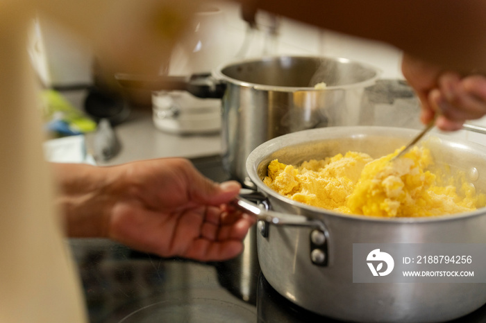 Close-up of man preparing food in kitchen