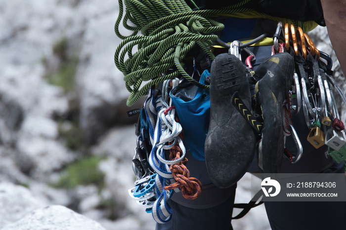 Closeup of a person from behind with hiking equipment