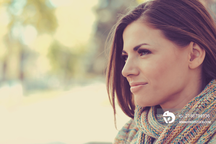 beautiful happy woman on a outdoors city street background