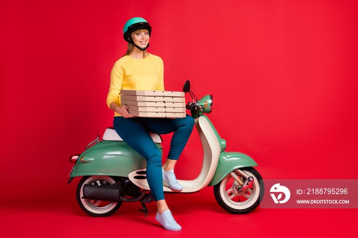 Full length body size view of her she nice attractive lovely cheerful cheery girl sitting on moped carrying bringing dessert italian bakery isolated on bright vivid shine vibrant red color background