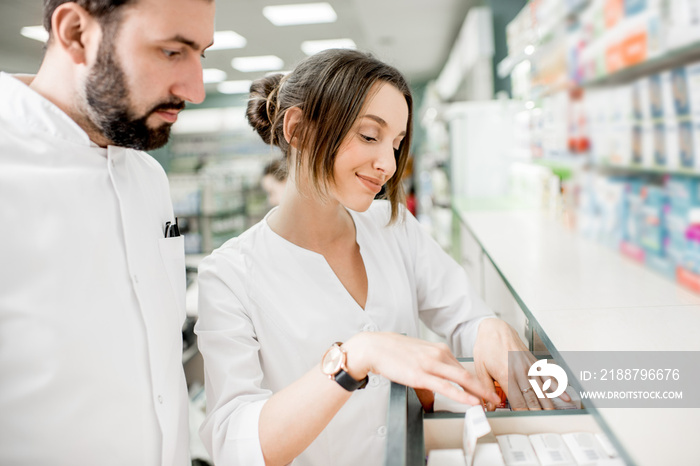 Pharmacists working in the pharmacy store