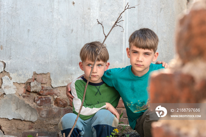 Two brothers are orphans, hiding in an abandoned house, frightened by the disaster and hostilities. Submission photo.