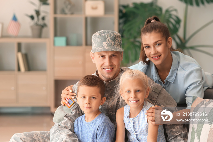 Happy military man with his family at home