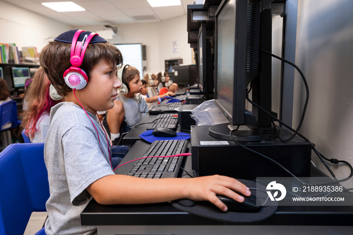 Children using a computer at school