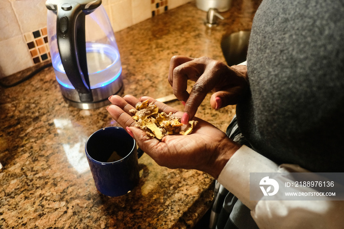 Grandma making ginger Tea