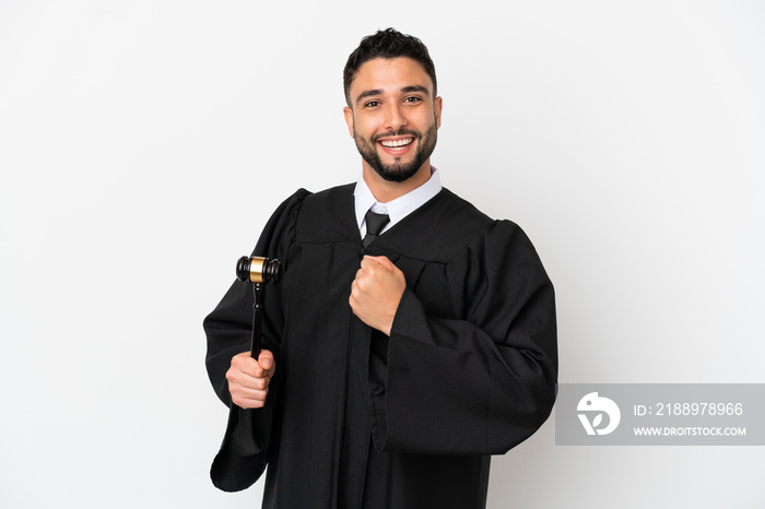 Judge arab man isolated on white background celebrating a victory