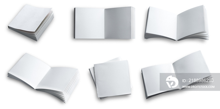 Collection of open blank note book on white background