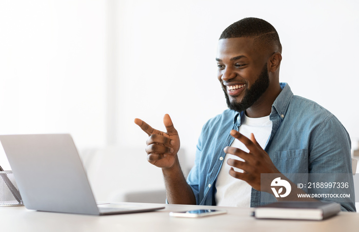 Online Communication. Happy African American Man Using Laptop For Video Call