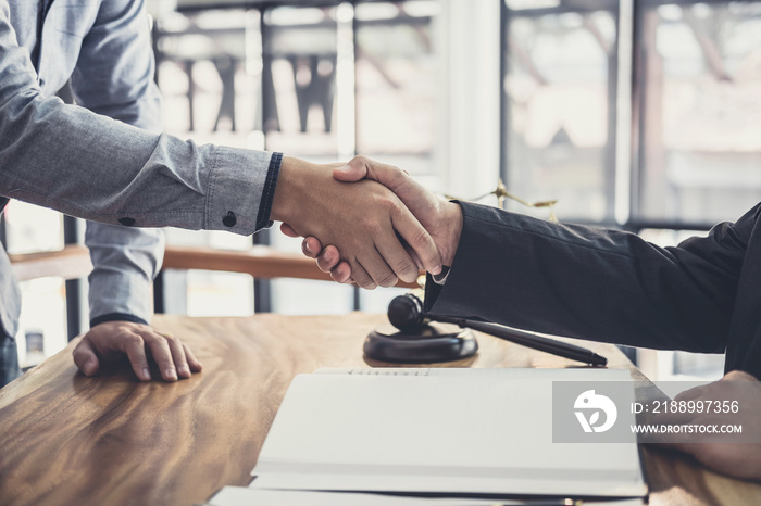 Handshake after good cooperation, Businessman Shaking hands with Professional male lawyer after disc