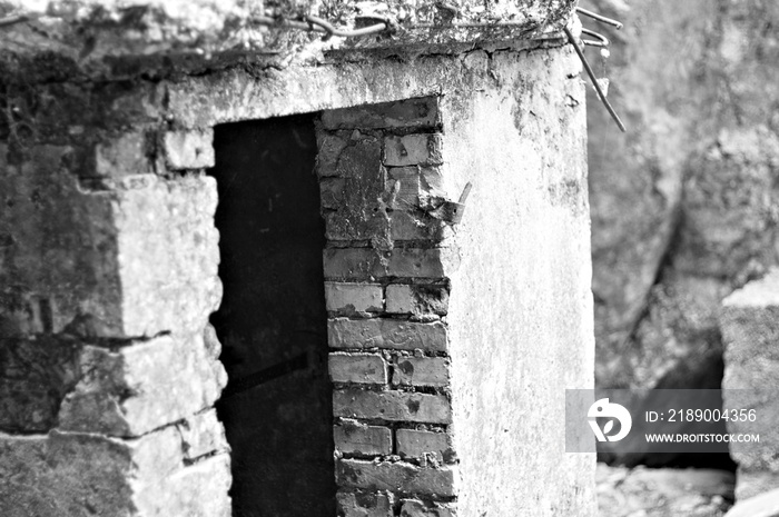 A door of an abandoned ruined building (Marche, Italy, Europe)