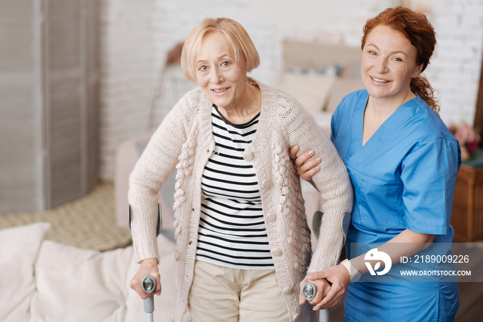 Happy mature woman having a walk after recovery