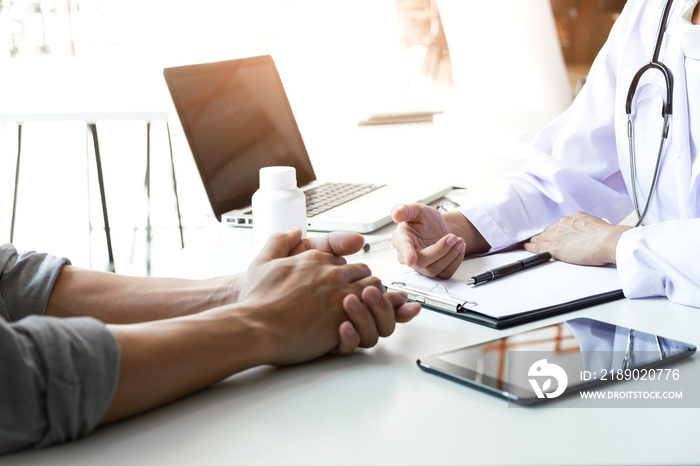 Healthcare and Medical concept, patient listening intently to a female doctor explaining patient sym