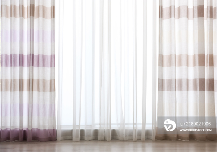 Beautiful silk curtains in room