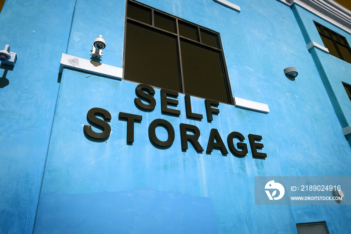 Self storage sign on building