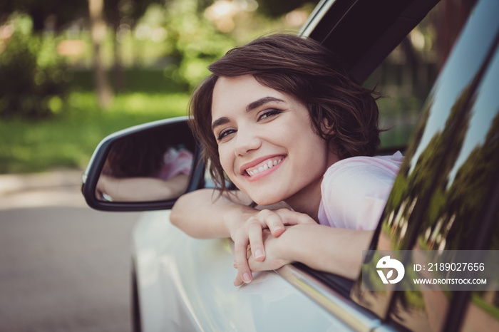 Closeup headshot photo of charming lovely lady cheerful look out of window smiling hands face chin c