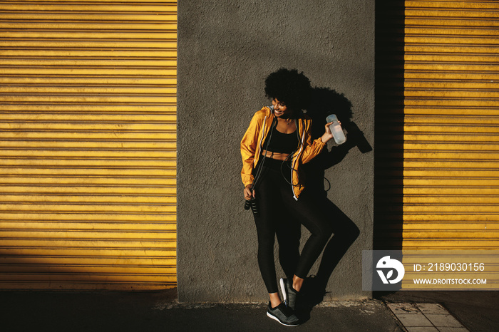 Female taking a break after exercising