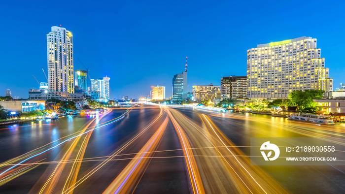 cityscape at night chao phraya river of bangkok city landscape Thailand , long exposure light