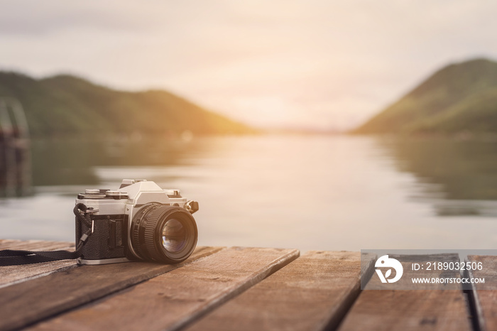 Retro camera with beautiful landscape