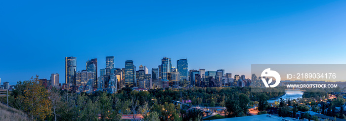 Skyline panoramic of Calgary, Alberta at sunset.