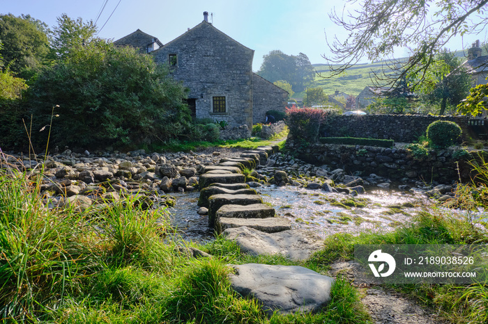 Stepping stones over a river at Stainforth in the Yorkshire Dales