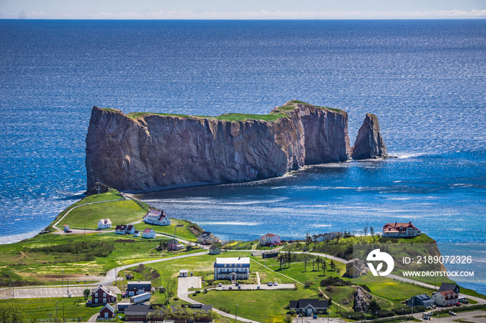 View on the Percé rock, the ocean, the cape Mont Joli, and the Percé Village from the Unesco Geopark