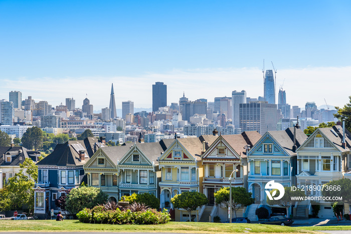 Beautiful view of Painted Ladies, colorful Victorian houses located near scenic Alamo Square in a ro