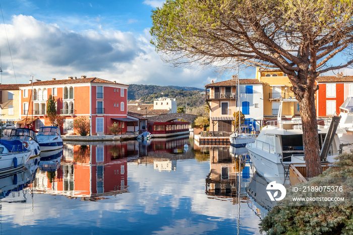 Colorful city on the water, Port of Grimaud, Côte dAzur, France, Provence, houses and boats. Beauti