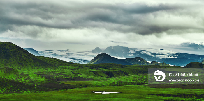 Travel to Iceland. Beautiful Icelandic landscape with mountains, sky and clouds. Trekking in nationa