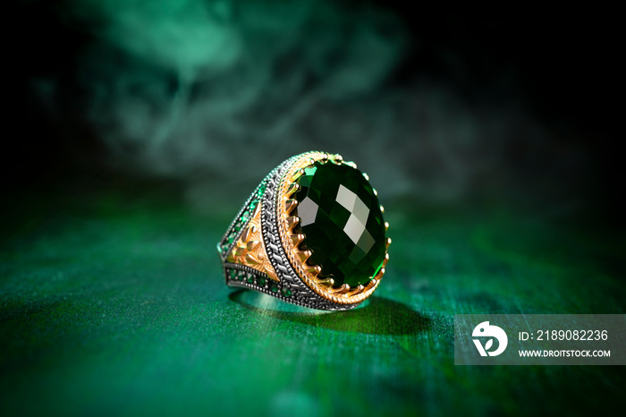 Silver ring with green stone