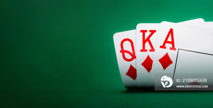 playing cards on a green table casino with copy space