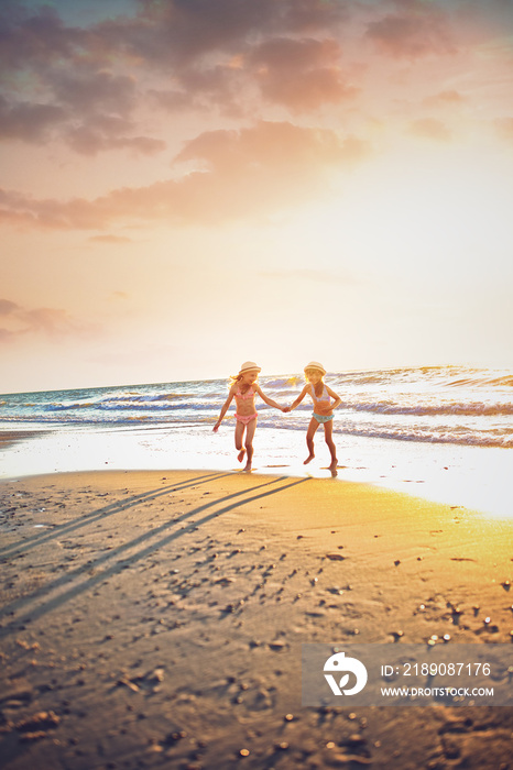 Young girls have fun on a beach