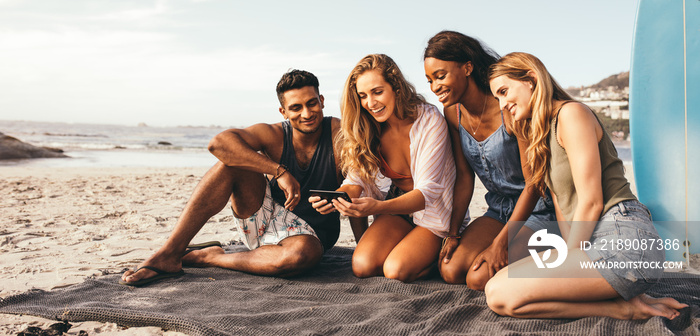 Friends enjoying at the beach