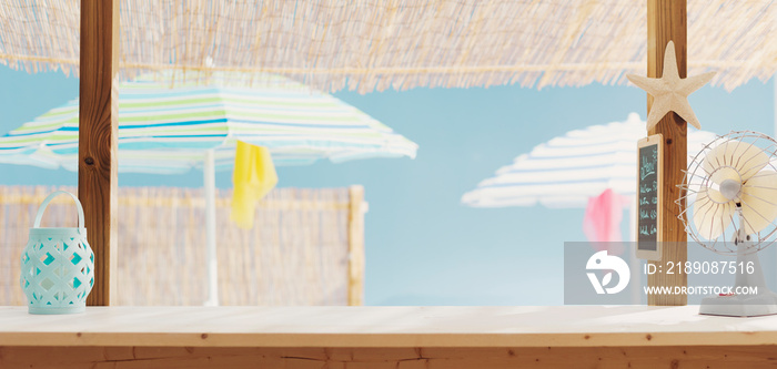 Beach bar kiosk and colorful beach umbrellas