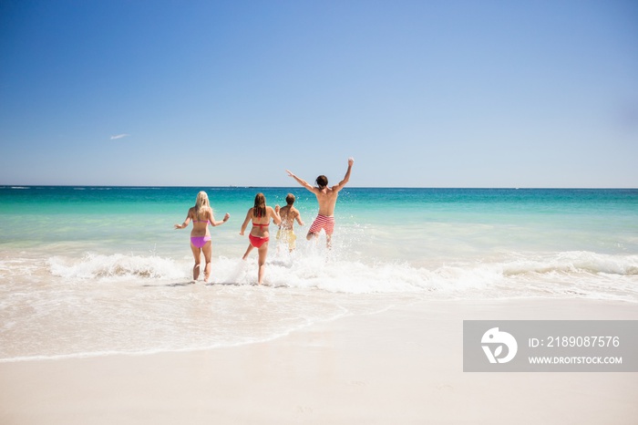  Friends having fun at the beach