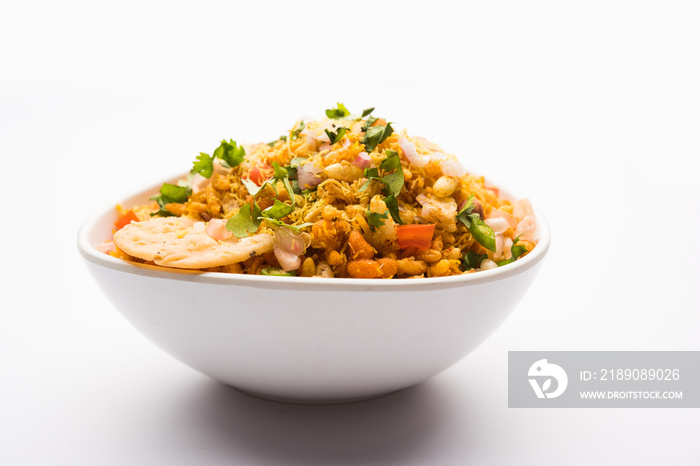 Bhelpuri Chaat/chat is a road side tasty food from India, served in a bowl or plate. selective focus