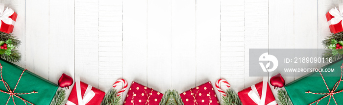 Colorful Christmas gift boxes on white wood banner background border design
