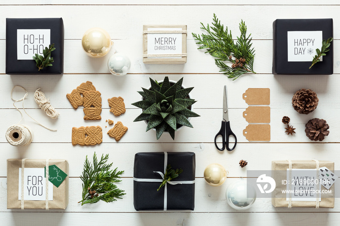 Elegant nordic retro christmas, wrapping station, desk view from above, DIY xmas concept