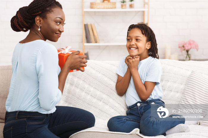 Black woman congratulating her child with birthday