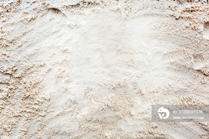 Bright beige sand textured background