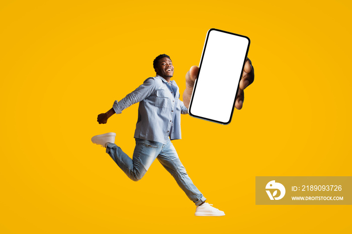 Brand new smartphone with blank screen in jumping guy hand