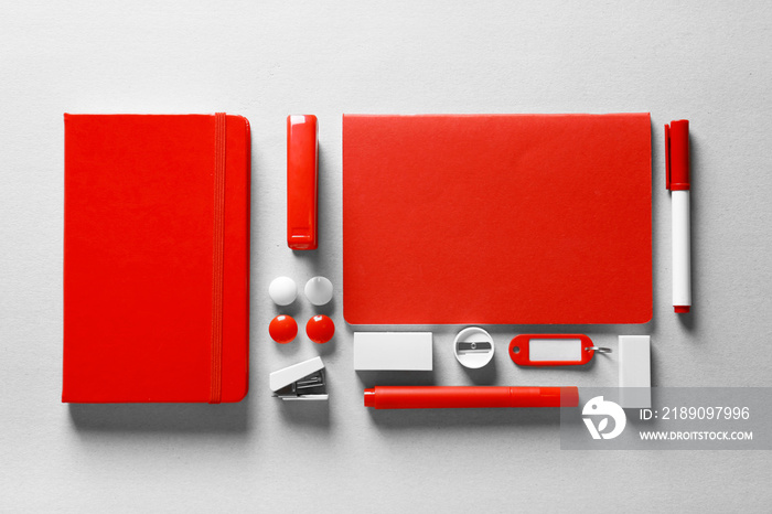 Red stationery on light background