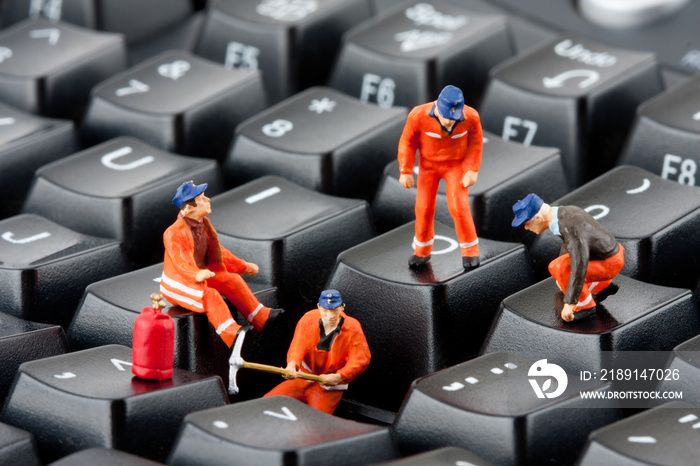 Workers repairing keyboard