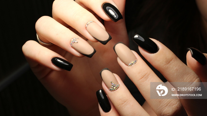 Youth manicure design, color coffee with rhinestones and black