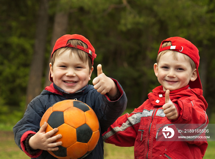 Happy kids with a ball