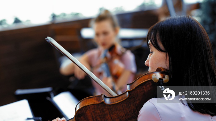 Violin Quartet Playing Classical Music Outside Restaurant, Summer Terrace Or Open Space In Lilliak D